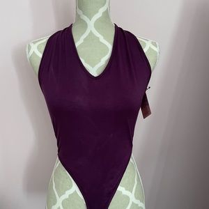 Open back brand new bodysuit